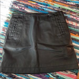 Faux leather short skirt with pockets